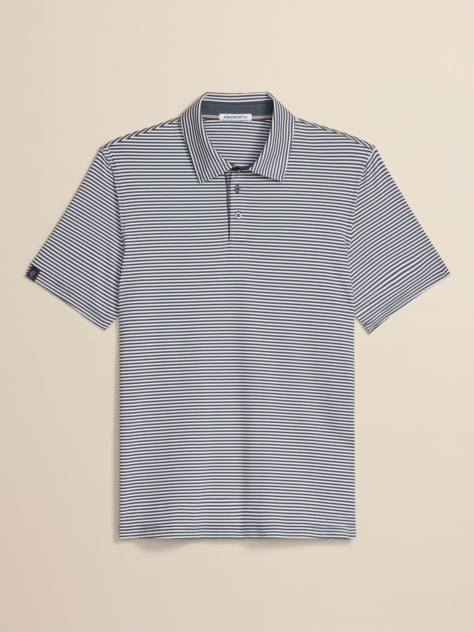 Striped polo shirt on a beige background