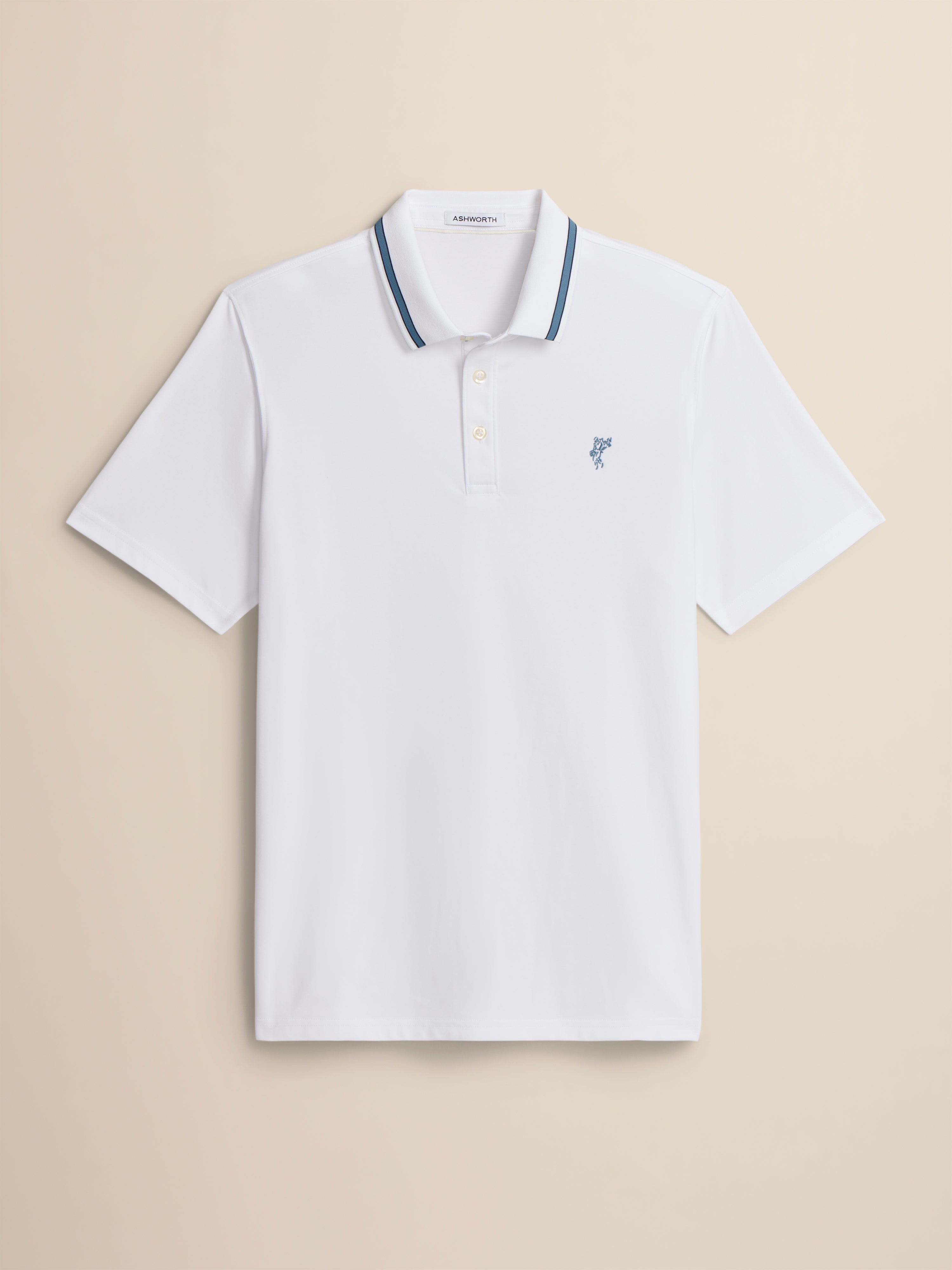 White polo shirt with blue trim on a beige background